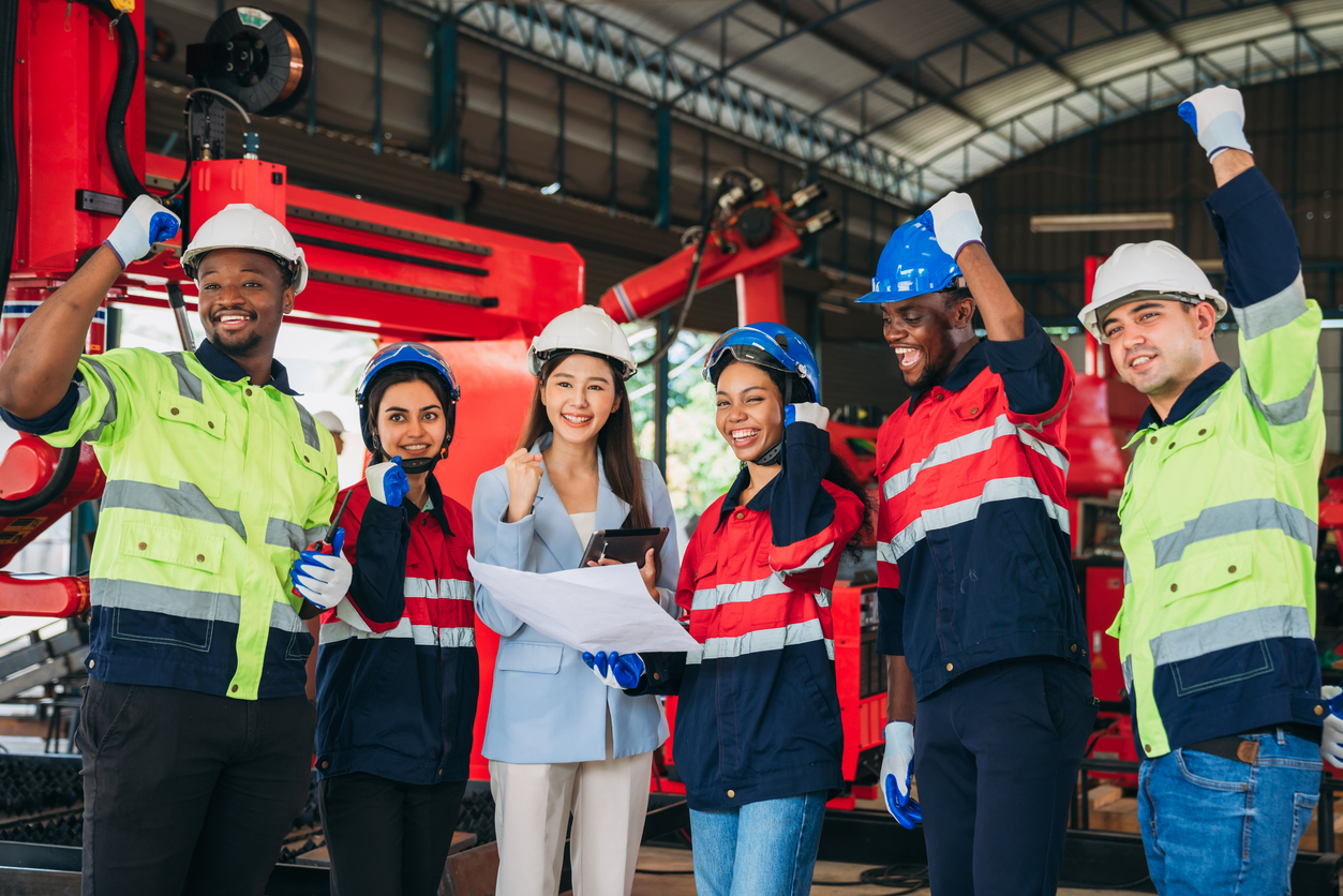 Team Engineers And Foreman Stack Hand And Shake Hands To Show Success At Factory Machines. Worker Industry Join Hand For Collaboration.